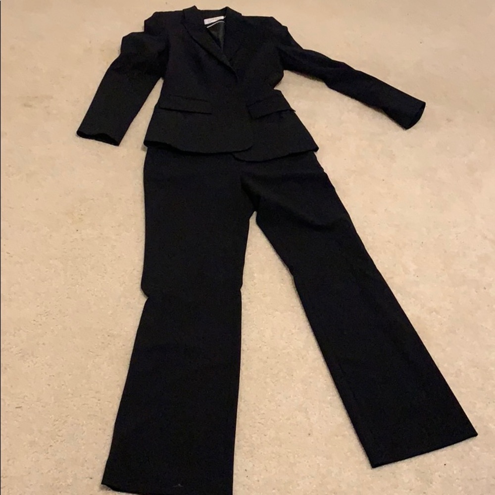Calvin Klein suit.